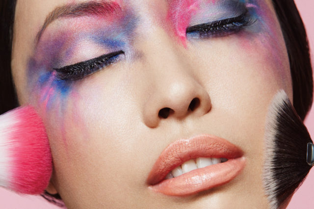woman with pink and purple makeup